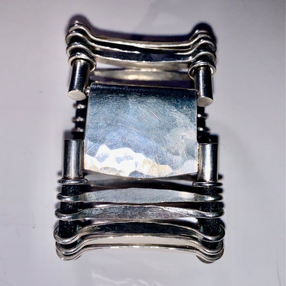 Silver bracelet on rope, size 6-6.5, no markings